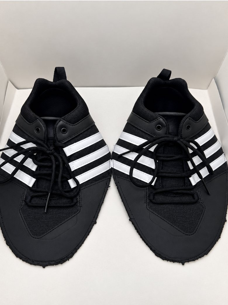 Black upper with white stripes