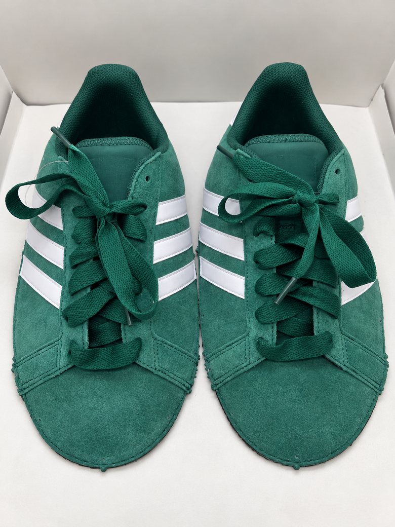 Green suede upper with white stripes